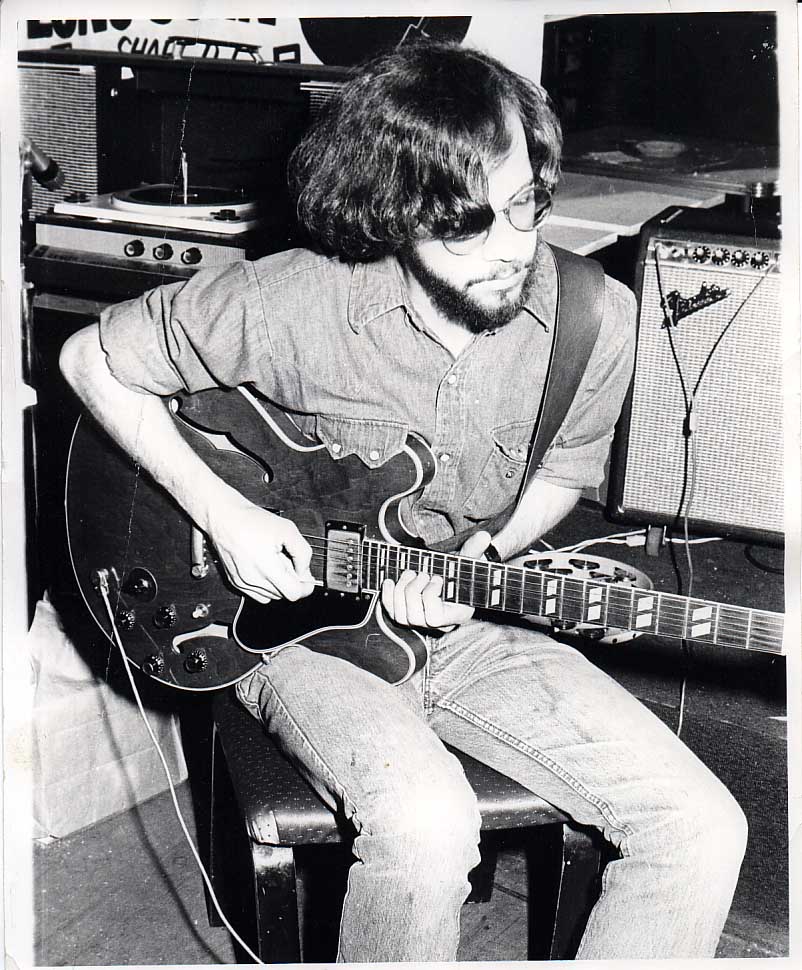 Playing guitar at The Suger Cube, 13th and Michigan, with the Sonny Wimberly Band, 1974