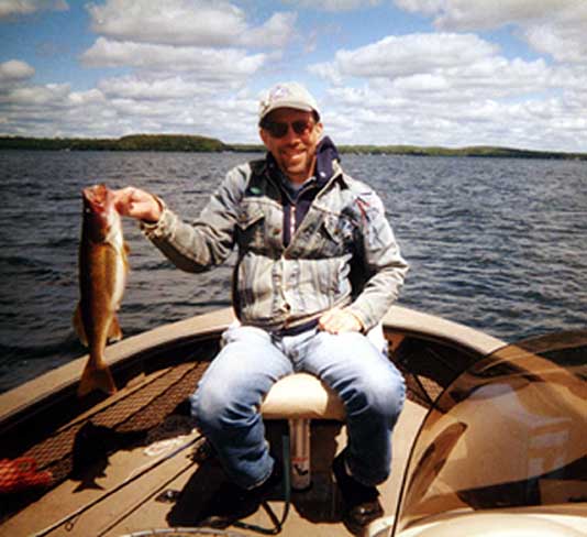 Harlan Terson and walleye; Fence Lake, Lac du Flambeau Chain, Wisconsin, August, 2002