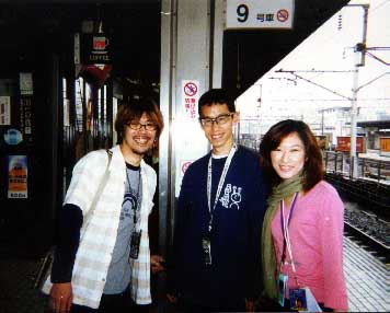 (Unknown), Katsu, and Kana at train station, Osaka, May 21, 2001